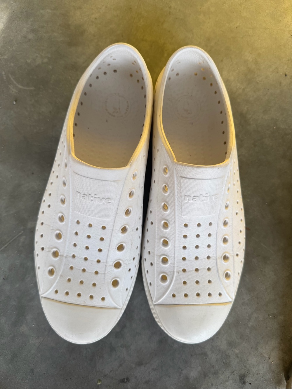 Native Slip-On Sneakers in White with Yellow Trim